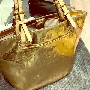 Woman’s purse color copper